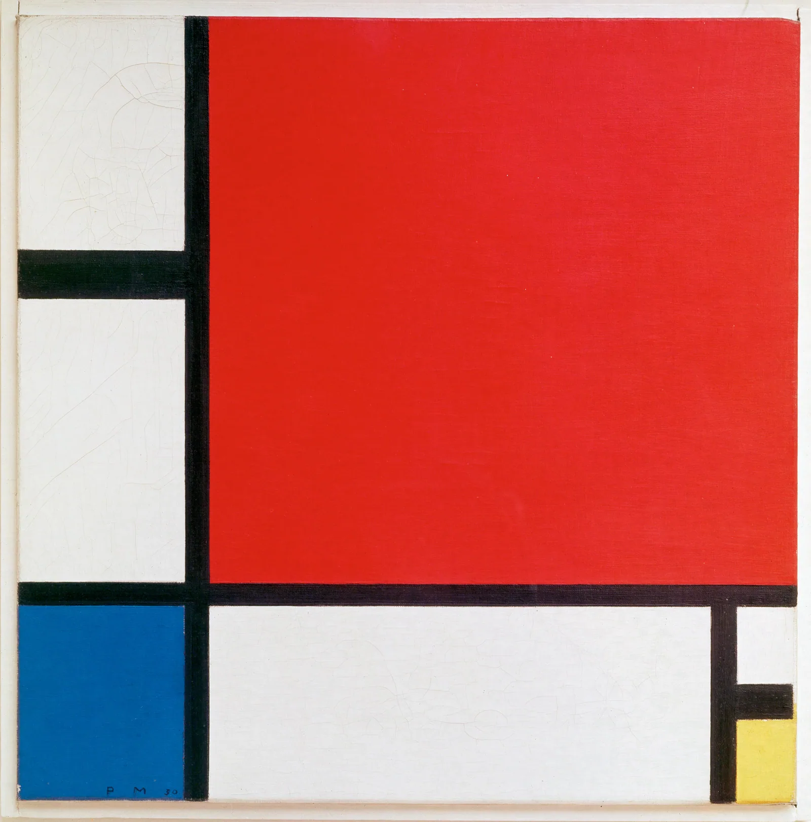 Composition en rouge, bleu et jaune B217 de Piet Mondrian : grand plan rouge, cases bleue et jaune et lignes noires sur fond blanc.